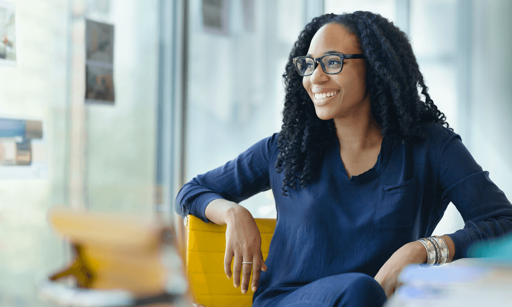 Women inside sitting down looking out window