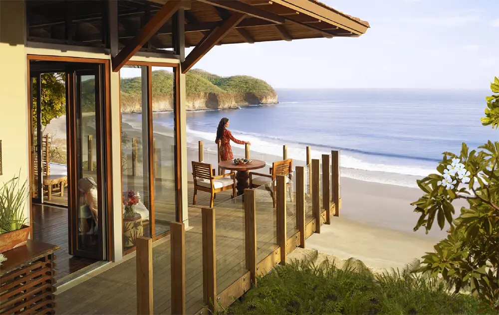 woman on deck looking out toward the ocean - not all credit scores are equal blog