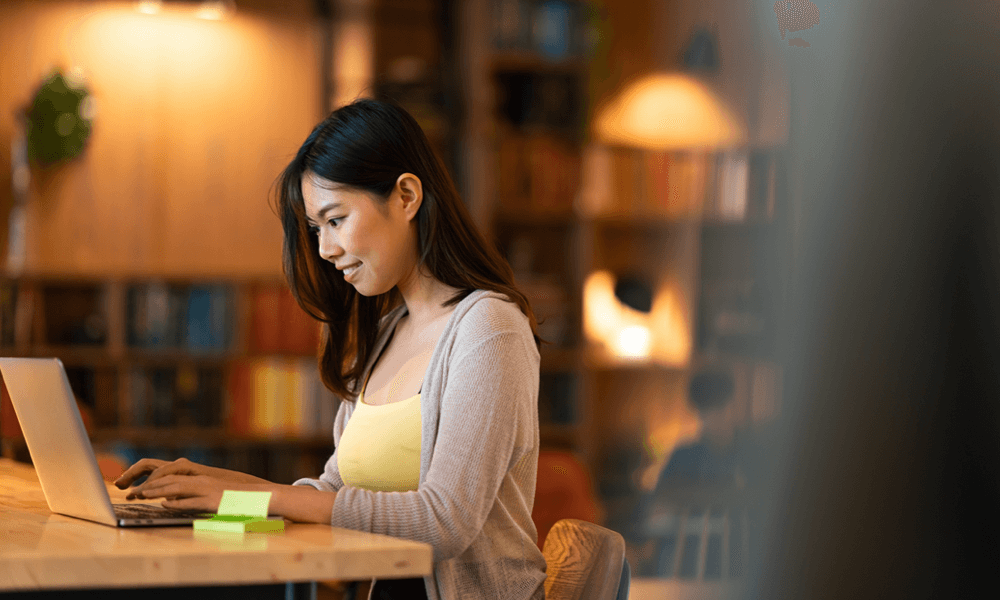 Woman at home working on computer