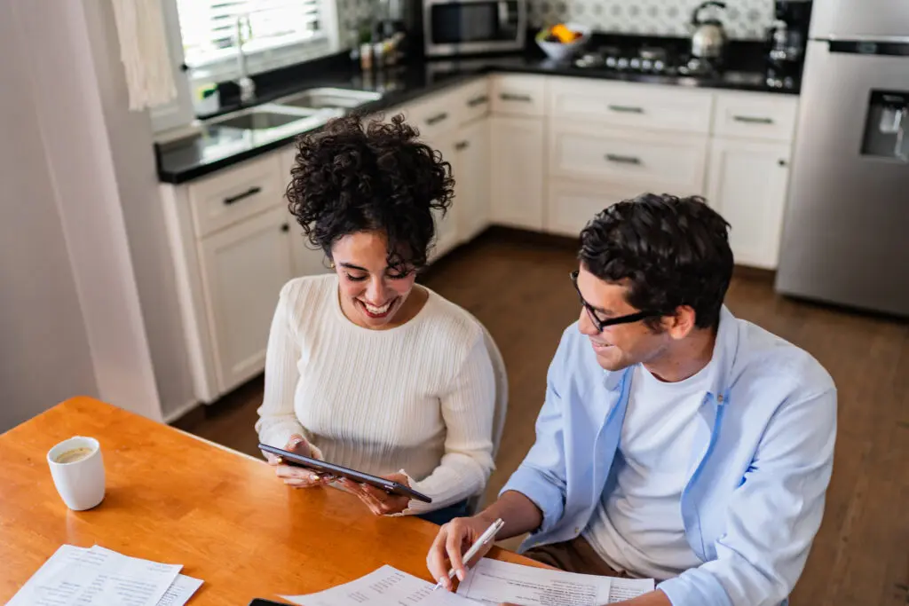 Young couple doing home finances