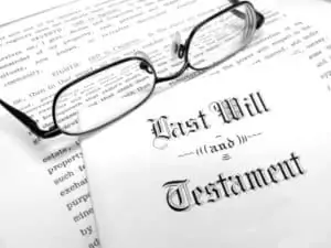 Last Will and Testament papers with glasses sitting on top