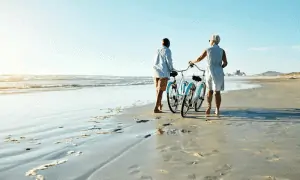 Couple watching on beaches with bikes