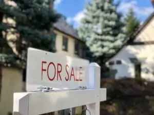 Real estate for sale sign in residential neighborhood, New Jersey, USA - Jumbo Mortgages blog