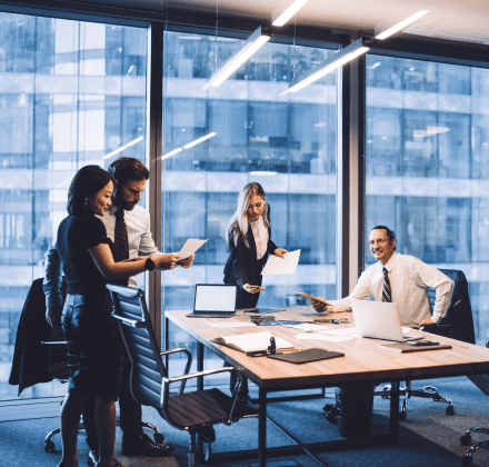 Business team in an office looking at documents