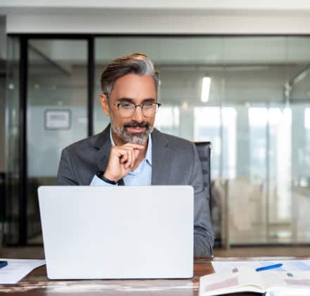 Business man looking at computer