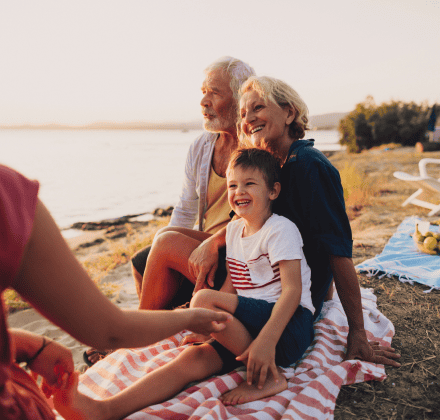 Three Generations of a First Western Trust client family enjoying a beach vacation.