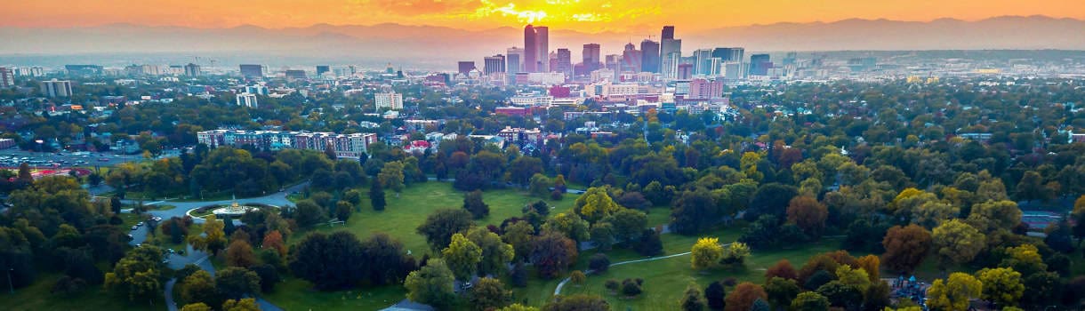 Denver city skyline with mountains in the background