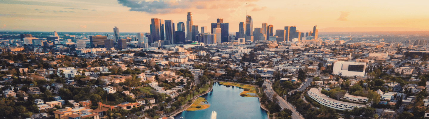 The Century City skyline with a body of water in the foreground